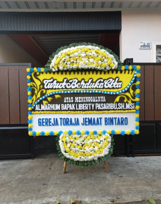 Papan Bunga Duka di Junti