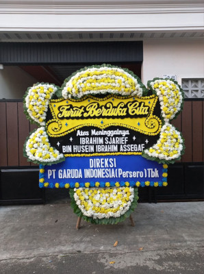 Papan Bunga Duka di Junti